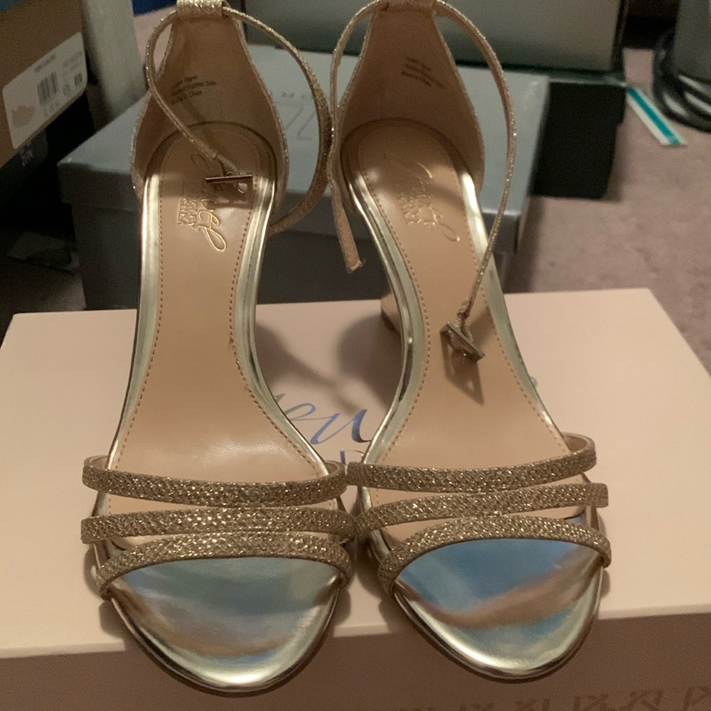 Strappy gold wedged heels
